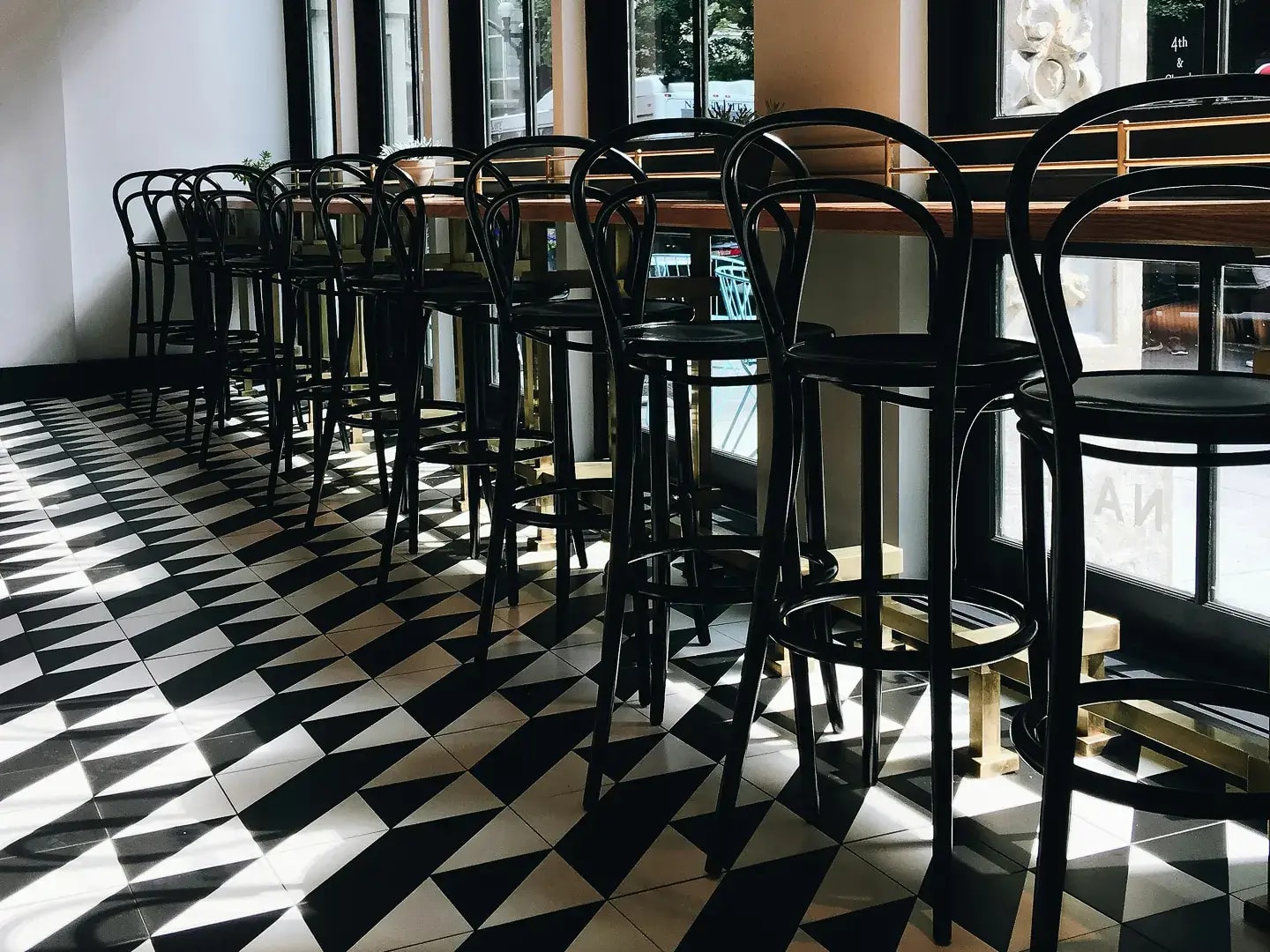 Restaurant seating area with porcelain tiled flooring.